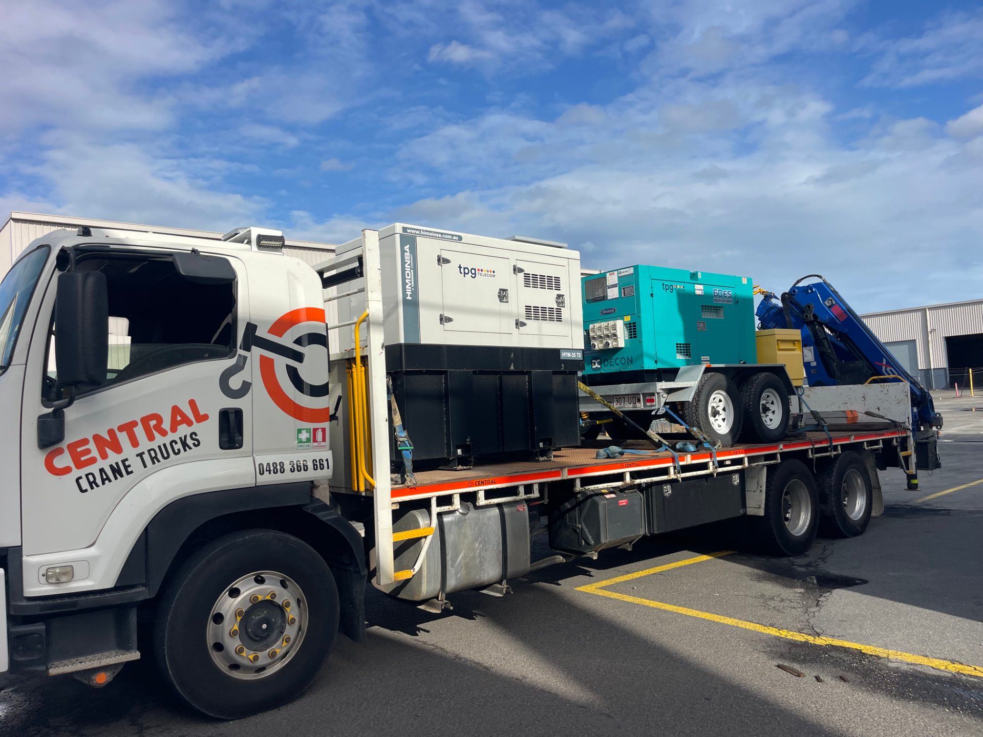 Central Crane Trucks crane truck loaded with generators for machinery and plant relocation in Brisbane